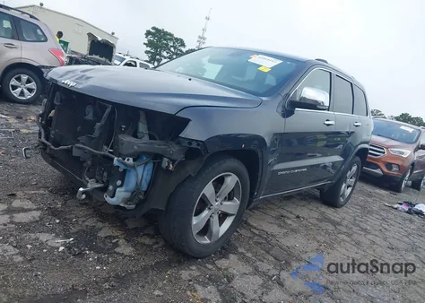 2014 Jeep Grand Cherokee Overland z USA, uszkodzony, nr VIN 1C4RJECGXEC198862